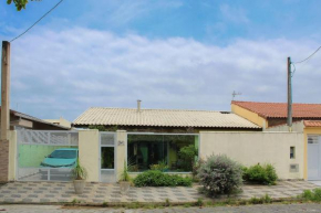 P004 - Casa com 3 dormitórios, churrasqueira e apenas 150m da praia